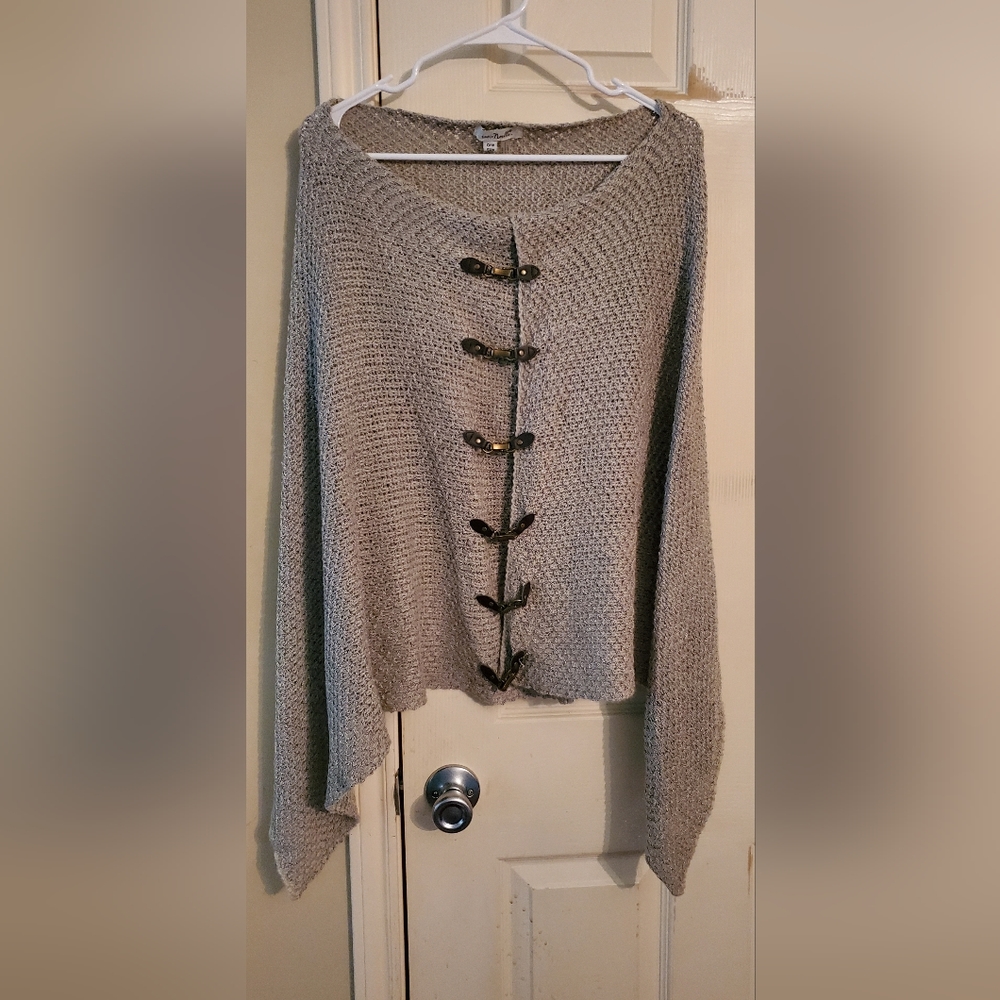 Simply Noelle poncho with functional clasps, one size, neutral oatmeal color